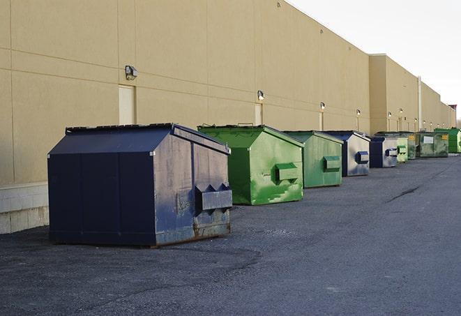 an assortment of sturdy and reliable waste containers near a construction area in Frankfort