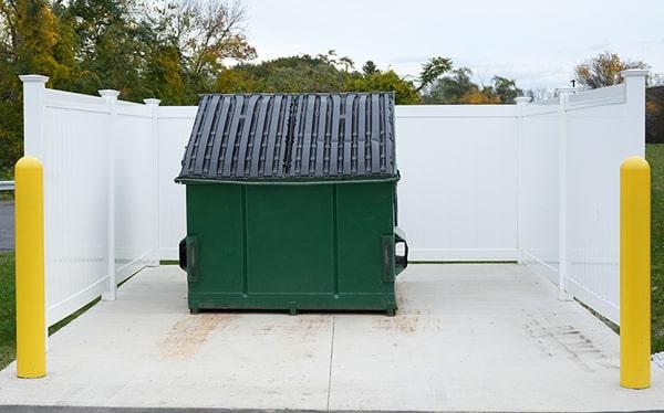 all of our commercial dumpsters come with covers to keep debris contained and prevent weather damage